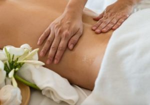 Female receiving relaxing body treatment