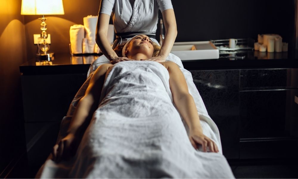 female massage patient receiving massage